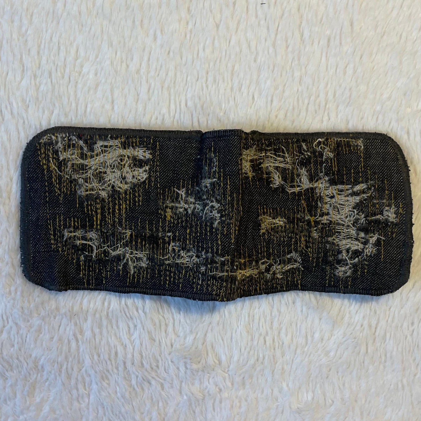 Gold stitches denim wallet