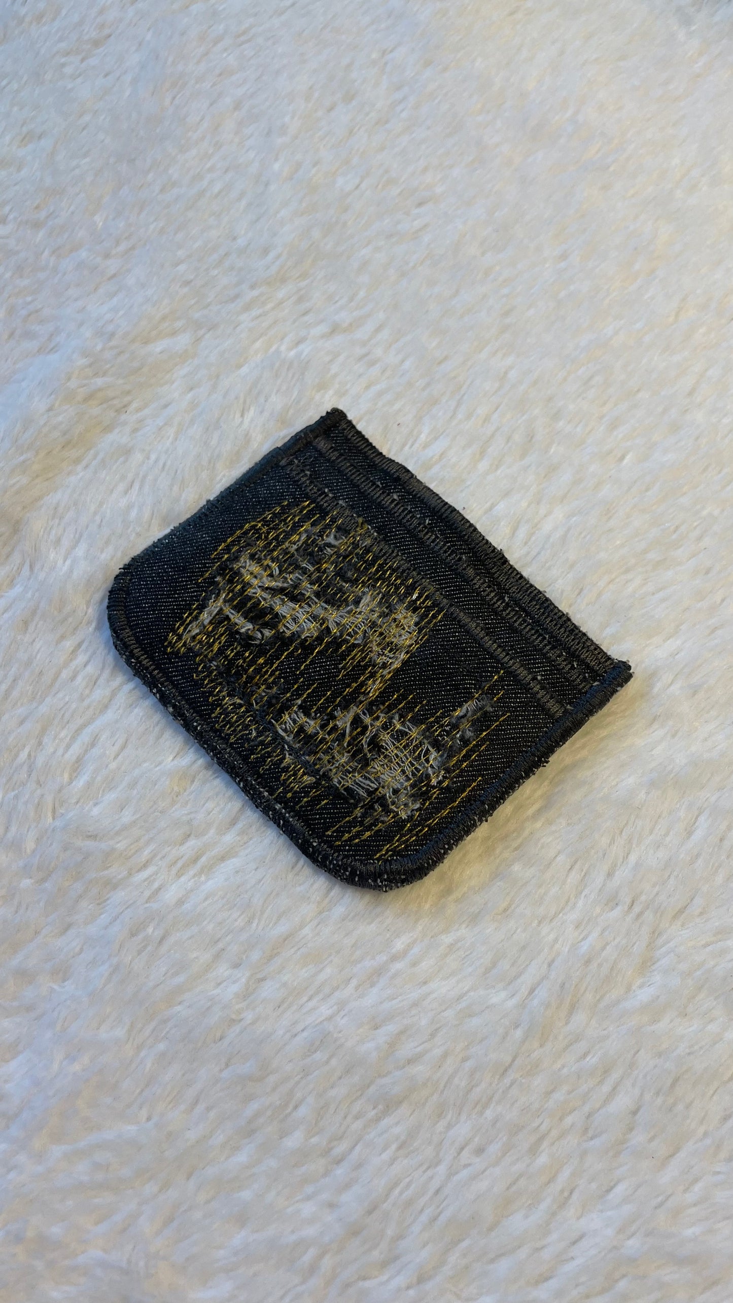 Gold stitches denim cardholder